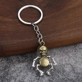 Portachiavi robot scheletro punk retrò in lega di bronzo e argento con parti mobili - Bronzo Antico