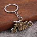Porte-clés moto vintage avec roues mobiles en finition bronze et argent poli - Bronze