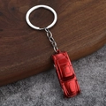 Llavero de coche clásico rojo de aleación de zinc con anillo plateado sobre fondo gris - Rojo