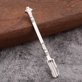 Portable silver metal spoon tool with vintage floral engraving and long narrow design - White K/Silver
