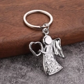 Porte-clés ange gardien en métal avec cœur sur fond texturé de style rustique - Argent