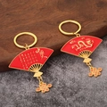 Porte-clés en forme d'éventail avec relief de dragon doré et nœud chinois rouge - Éventail Chinois