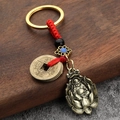 Retro bronze keychain featuring antique coins, red woven rope, and Maitreya Buddha pendant - Five Emperors Coins + Maitreya