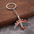 Civil aviation airplane keychain in silver zinc alloy with red and yellow wing accents - Red and Yellow