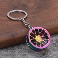 Rainbow gradient metal alloy car wheel rim keychain with a multi-spoke creative design - Iridescent