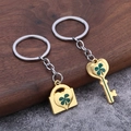 Porte-clés trèfle à quatre feuilles doré avec pendentifs serrure et clé pour couple - Paire d'Or Imitation