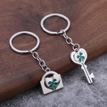 Porte-clés trèfle à quatre feuilles avec breloques serrure et clé en métal argenté - Paire Argent K Blanc