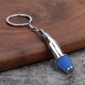 Detailaufnahme von silbernem Luftfilter-Schlüsselanhänger mit blauem Filterelement - Silber Blau