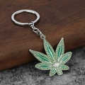 Llavero hip hop con hoja de maple verde, cristales brillantes y acabado esmalte - Plata + Diamante de Imitación Verde