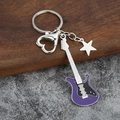 Detail view of purple enamel electric guitar keychain with star and heart-shaped clasp - Small Solid / Purple