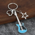 Detail of guitar keychain with blue enamel pendant, silver star, and heart-shaped carabiner - Small Hollow / Blue