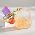 Porte-clés liquide en acrylique avec paillettes orange et perles en forme d'étoile - Style Sac à Dos Sable Mouvant Lumineux / Orange Lumineux