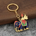 Exquise Thaise olifant sleutelhanger met blauw emaille en goudkleurige afwerking - Blauw
