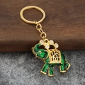 Elegante portachiavi a forma di elefante in smalto verde con lega dorata e strass bianchi - Verde