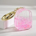 Porte-clés sac à dos en acrylique rose avec sable mouvant liquide et paillettes - Fermoir Unique Lumineux Rose