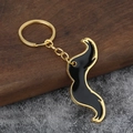 Kreativer Metall-Schlüsselanhänger in Schnurrbartform mit Emaille und Gold-Finish - Gold