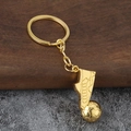 Gouden draaibare voetbal sleutelhanger met voetbalschoen hanger en sportief detail - Goud