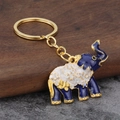 Portachiavi creativo con elefante in smalto blu e bianco e struttura in metallo dorato - Blu scuro