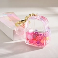 Porte-clés cartable rose en acrylique avec sable mouvant, perles colorées et anneau doré - Style Corde Bonbons Rose