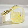Porte-clés mini sac à dos jaune en acrylique avec paillettes et fermoir doré - Fermoir Unique Lumineux Jaune Citron