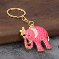 Pink enamel elephant keychain with gold crown and zinc alloy texture on wooden base - Rose Red