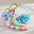 Porte-clés sac à dos bleu en acrylique avec perles colorées et chaîne holographique - Style Chaîne Bonbons Bleu