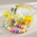 Mini sac à dos jaune porte-clés avec perles colorées et grand nœud jaune décoratif - Style Chaîne Bonbons Jaune Citron