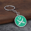 Dettaglio del portachiavi in lega di zinco con logo in smalto verde stella e luna - Argento + Verde (Logo dell'esercito pakistano)