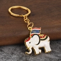 Portachiavi con elefante e bandiera della Thailandia in smalto bianco su legno - Bianco
