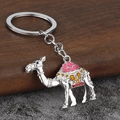 Silver camel keychain with pink enamel hump and decorative colorful resin stones - Silver + Pink