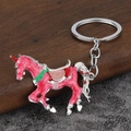 Portachiavi a carosello in smalto rosa e bianco con anello metallico su legno - Argento & Rosa