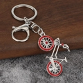Creative silver bicycle keychain with red rhinestones and metal lobster clasp - Silver-Red Zircon