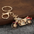 Rhinestone Harley-style motorcycle metal keychain with golden plating and lobster clasp - Gold + Red