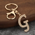 Golden metal letter G keychain with rhinestones and lobster clasp for bags - Letter G