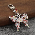 Porte-clés papillon en cristal coloré avec strass brillants et fermoir mousqueton - Base Argentée Strass Coloré