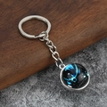 Luminous constellation glass cabochon keychain with celestial blue pattern and silver ring - Pisces