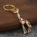 Portachiavi giraffa colorato con placcatura in metallo dorato e pois in smalto - Oro