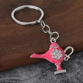 Primer plano del llavero de lámpara de Aladino rosa con flores de circón brillantes - Plata + Rosa