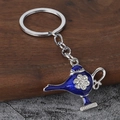 Detalle del llavero lámpara de Aladino con esmalte azul e incrustaciones de strass brillante - Plata & Azul