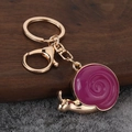 Exquisite golden snail keychain with purple enamel shell and lobster clasp charm - Gold-Purple