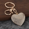 Porte-clés cœur doré serti de strass blancs brillants avec fermoir mousqueton - Zircon Blanc