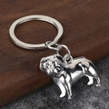 Macro detail of a silver bulldog keychain with realistic zinc alloy texture and metal ring - Bulldog Shape / White K/Silver