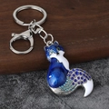 Detail of fox keychain with royal blue enamel finish and sparkling blue rhinestones - Silver & Blue