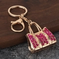 Detail of pink crystal handbag keychain with gold alloy lobster clasp for bags - Gold Plated Rose Red Zirconia