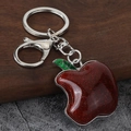 Portachiavi a forma di mela rossa luccicante con foglia verde e chiusura a moschettone - Mela Rossa Chiusura Argentata (Bianco K) / Bianco K/Argento