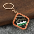 Portachiavi Kaaba in metallo dorato con smalto colorato per auto e borse - Arancione