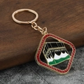Portachiavi dorato Kaaba con smalto colorato e accenti rossi su base in legno - Rosso