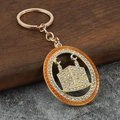 Portachiavi ovale placcato oro con strass scintillanti e motivo architettonico islamico - Giallo chiaro