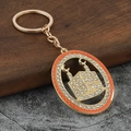 Dettaglio di un portachiavi moschea islamica placcato in oro con strass brillanti - Giallo Scuro