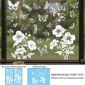 Détail de stickers statiques de papillons et fleurs blancs sur une surface vitrée - 30x60cm(2 Feuilles) / Blanc